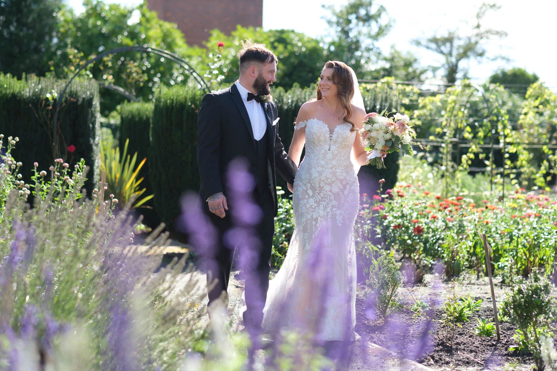 Couple kissing with a beautiful sunset at All Manor of Events Heffs Photography