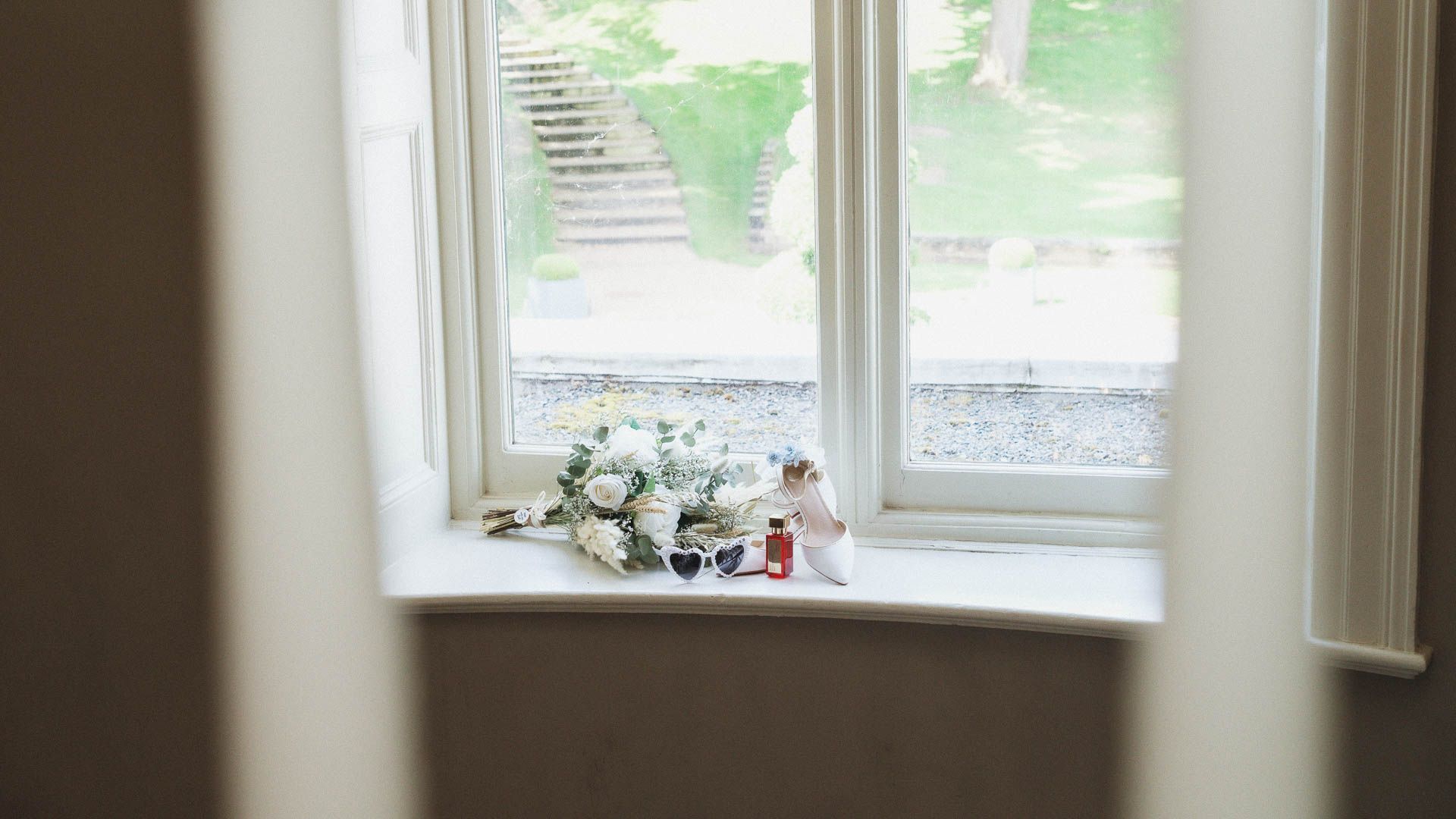 Couple kissing with a beautiful sunset at All Manor of Events Heffs Photography
