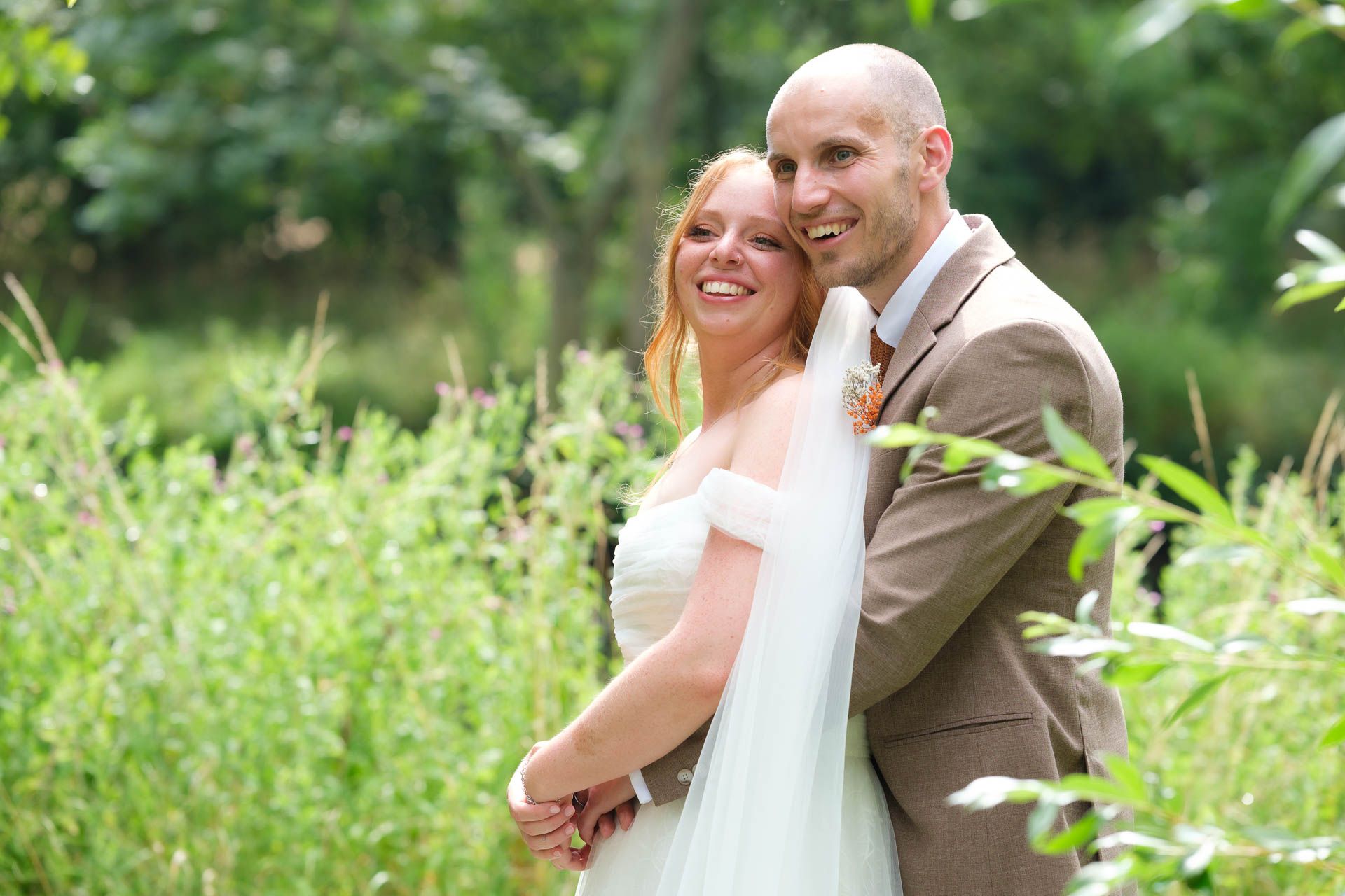 Couple kissing with a beautiful sunset at All Manor of Events Heffs Photography