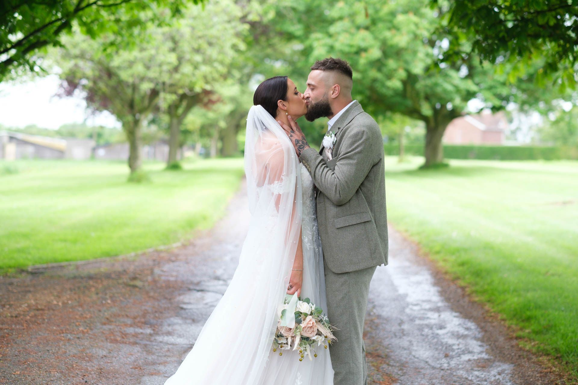 Couple kissing with a beautiful sunset at All Manor of Events Heffs Photography