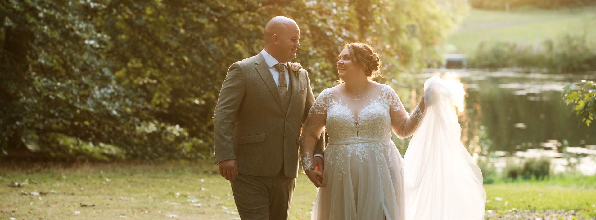 Nicole and Wills wedding at Wivenhoe house, walking through the golden hour, Heffs Photography