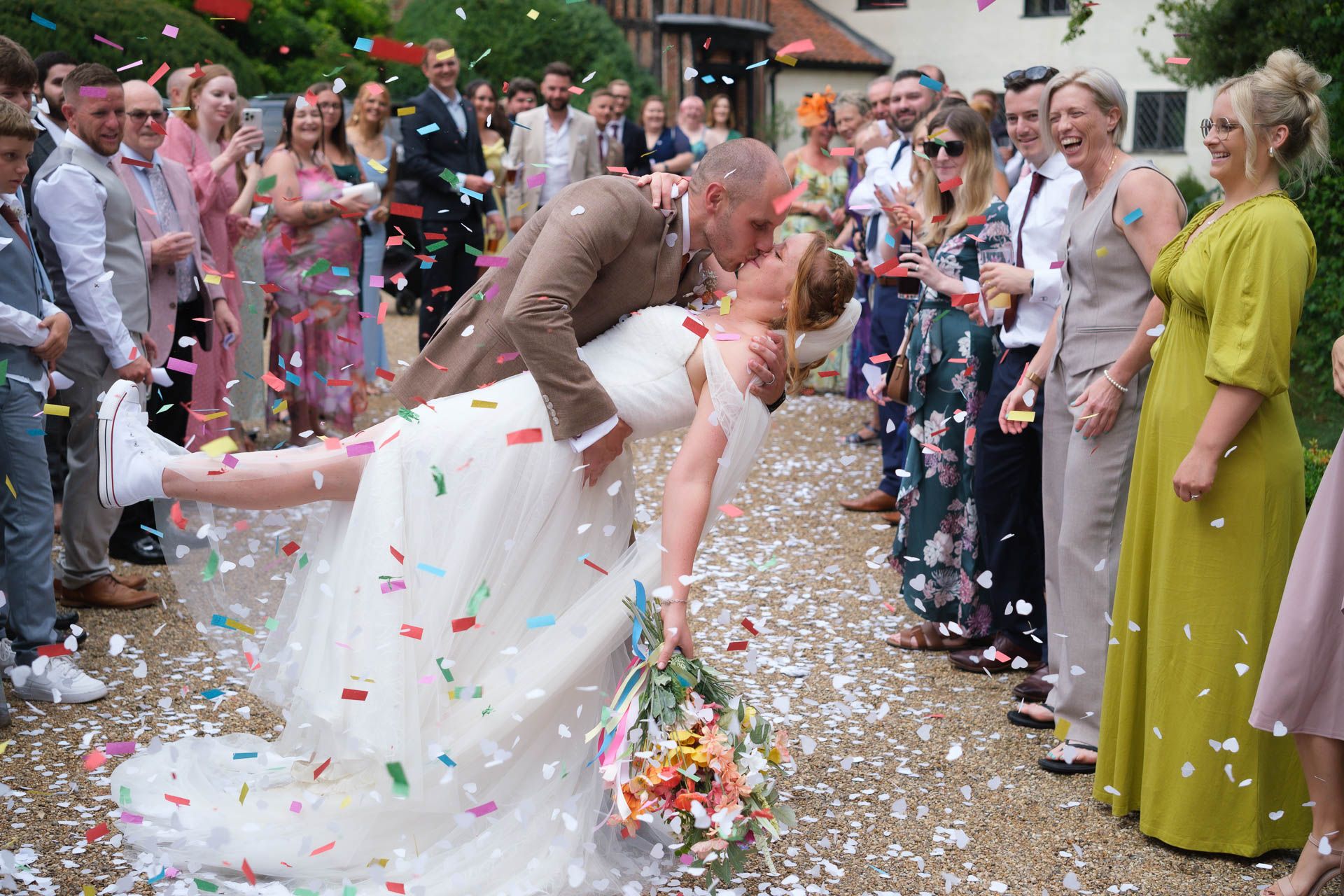 Couple kissing with a beautiful sunset at All Manor of Events Heffs Photography