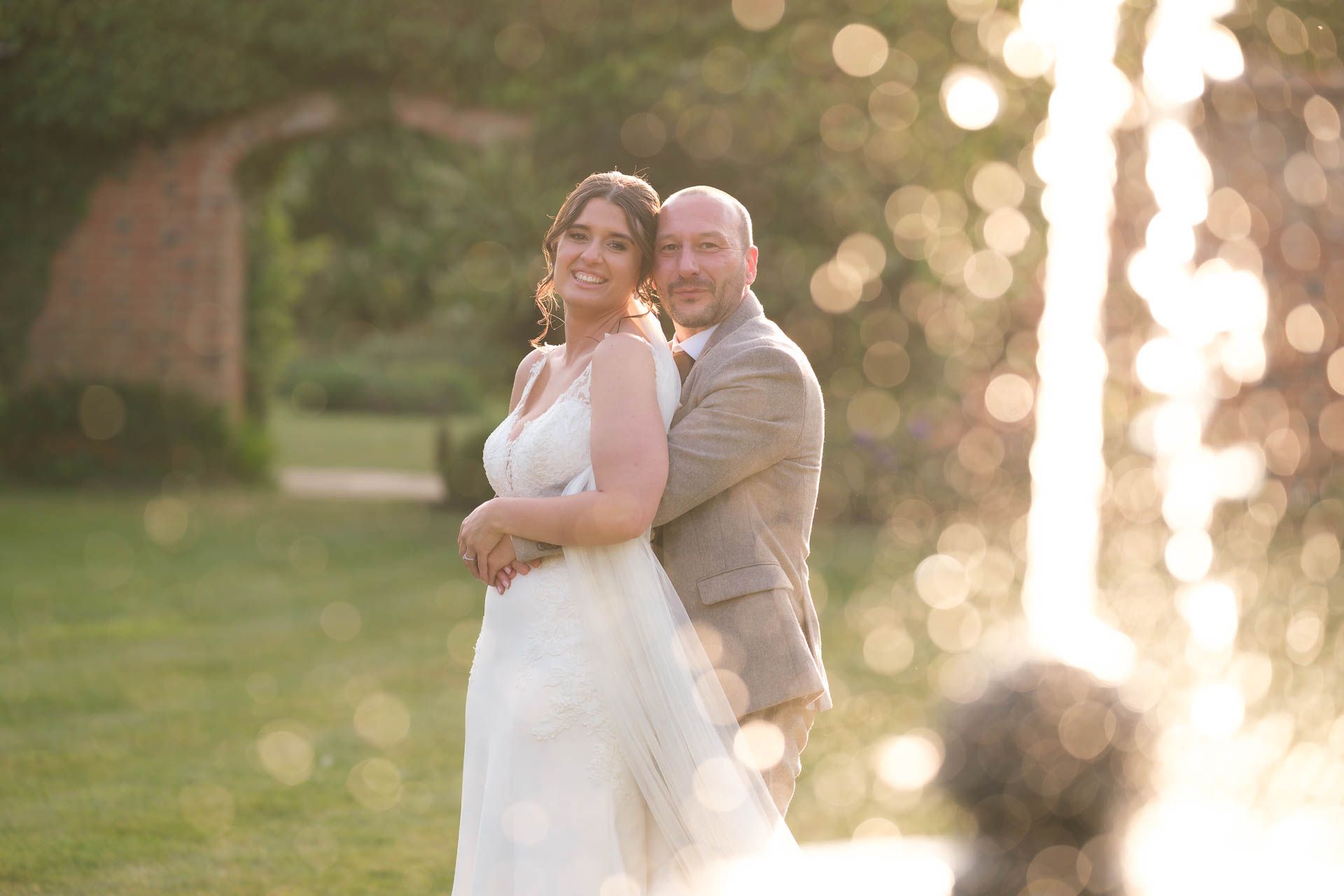 Couple kissing with a beautiful sunset at All Manor of Events Heffs Photography